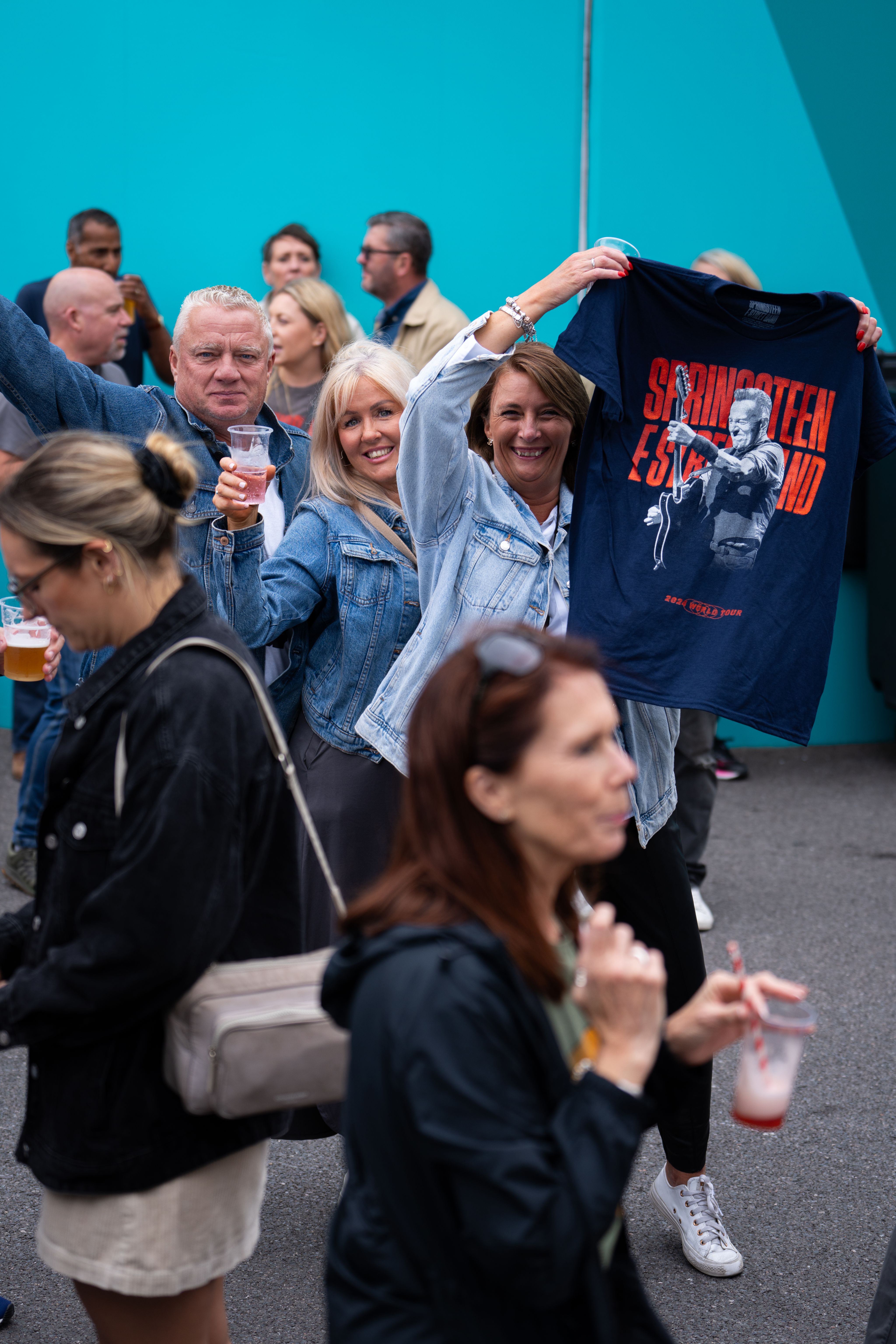 A Bruce fan holds up her tour t-shirt outside Wembley Stadium