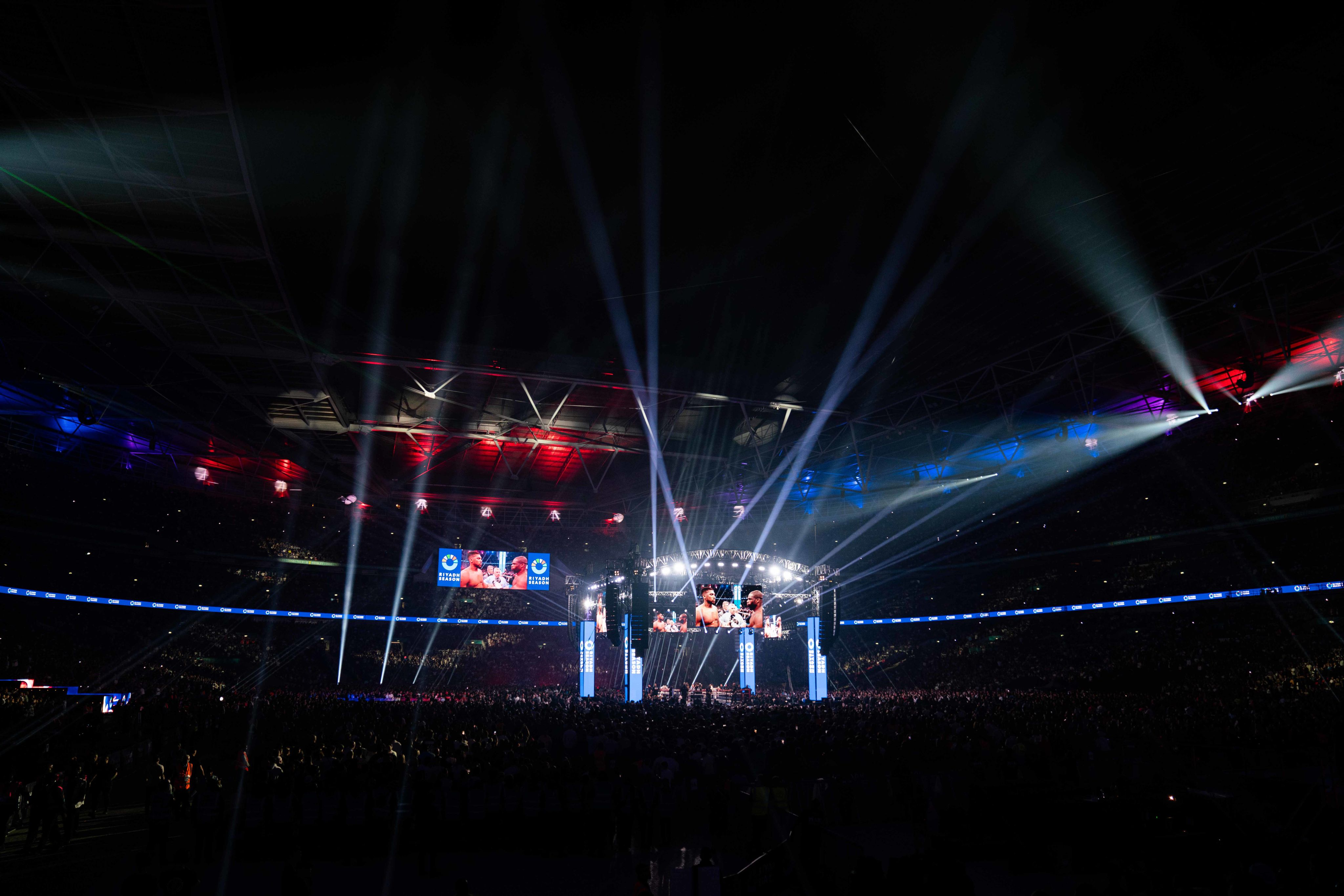 A picture of the ring lit up just prior to the fight starting