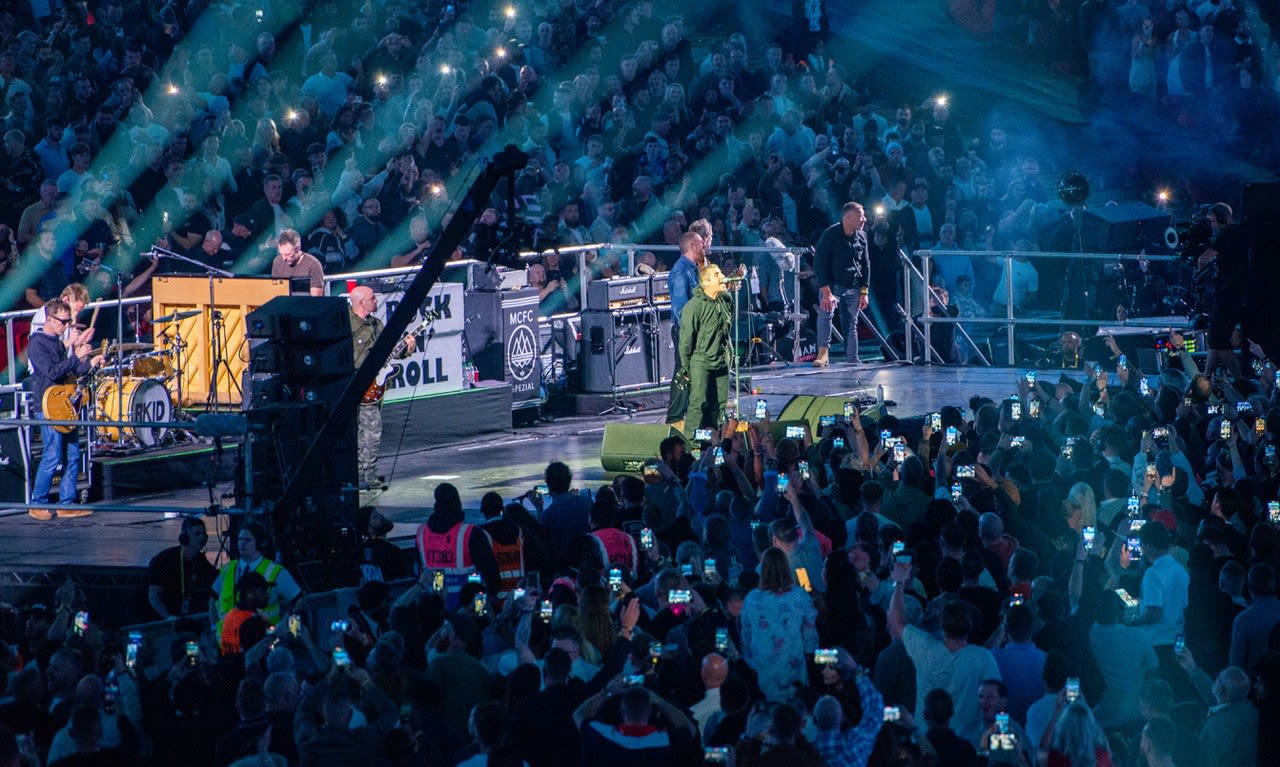 Liam Gallagher performs on stage in the build up to Joshua Dubois
