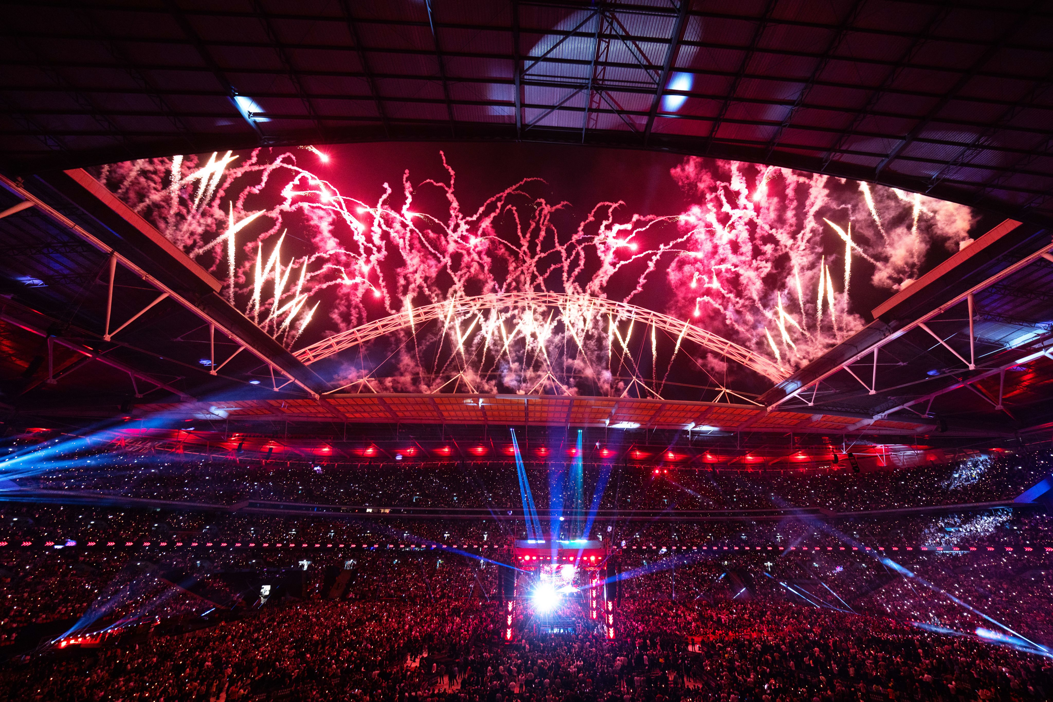 A photo taken during Joshua Dubois as fireworks are being released from the roof and arch