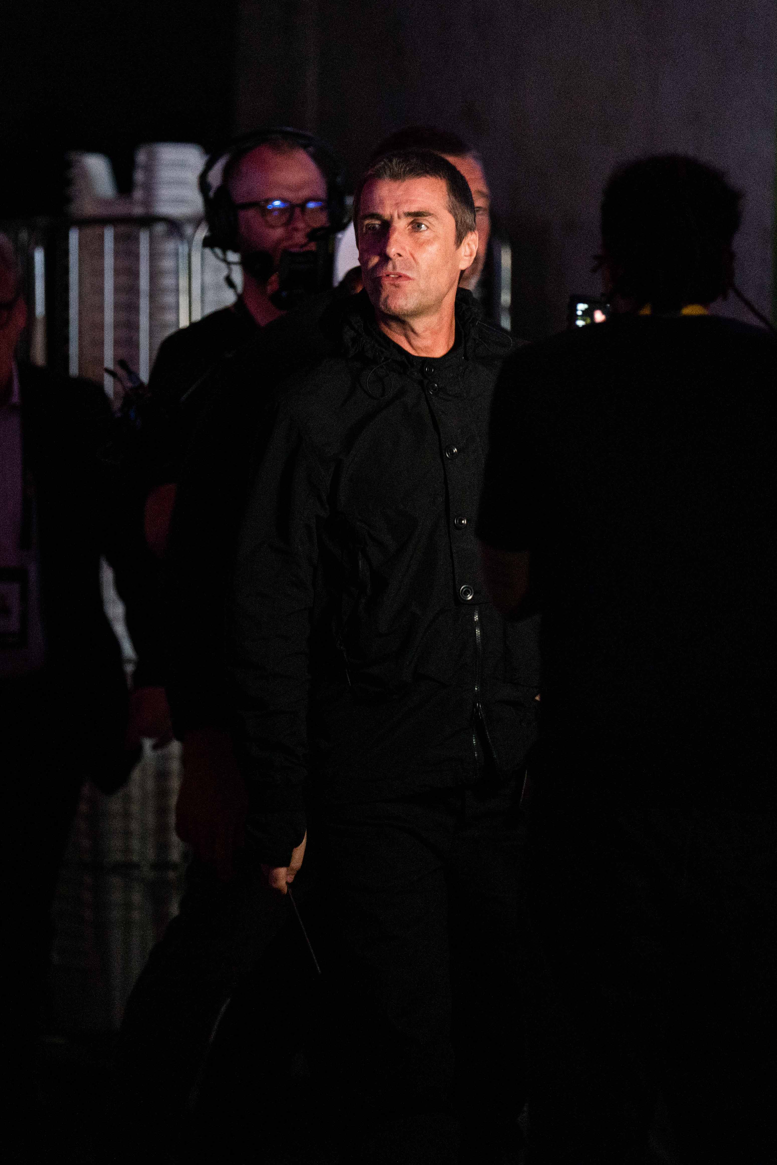 Liam Gallagher performs on stage in the build up to Joshua Dubois